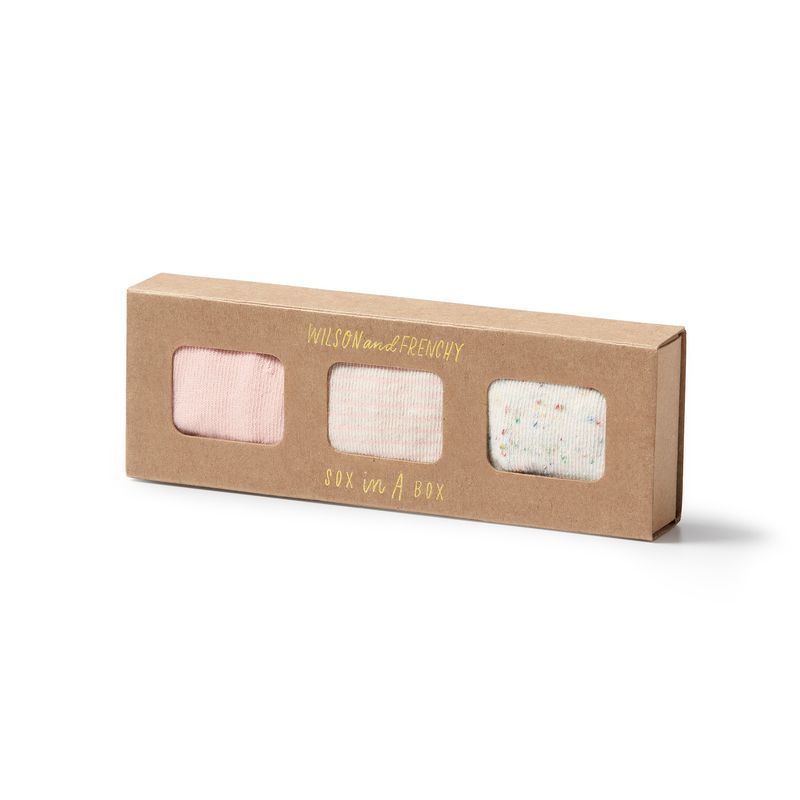 Wilson and Frenchy Sox in a box