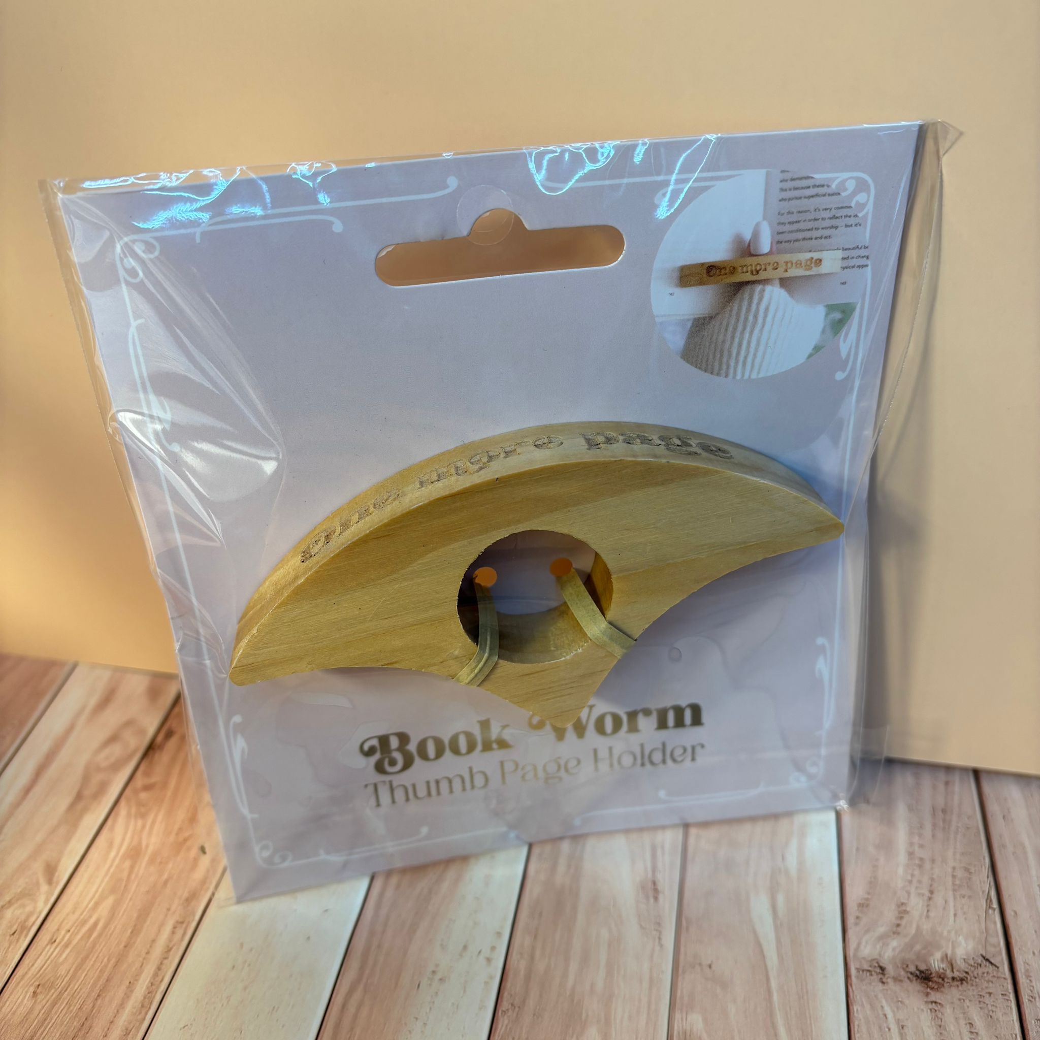 Daumen-Seitenhalter„One more page“