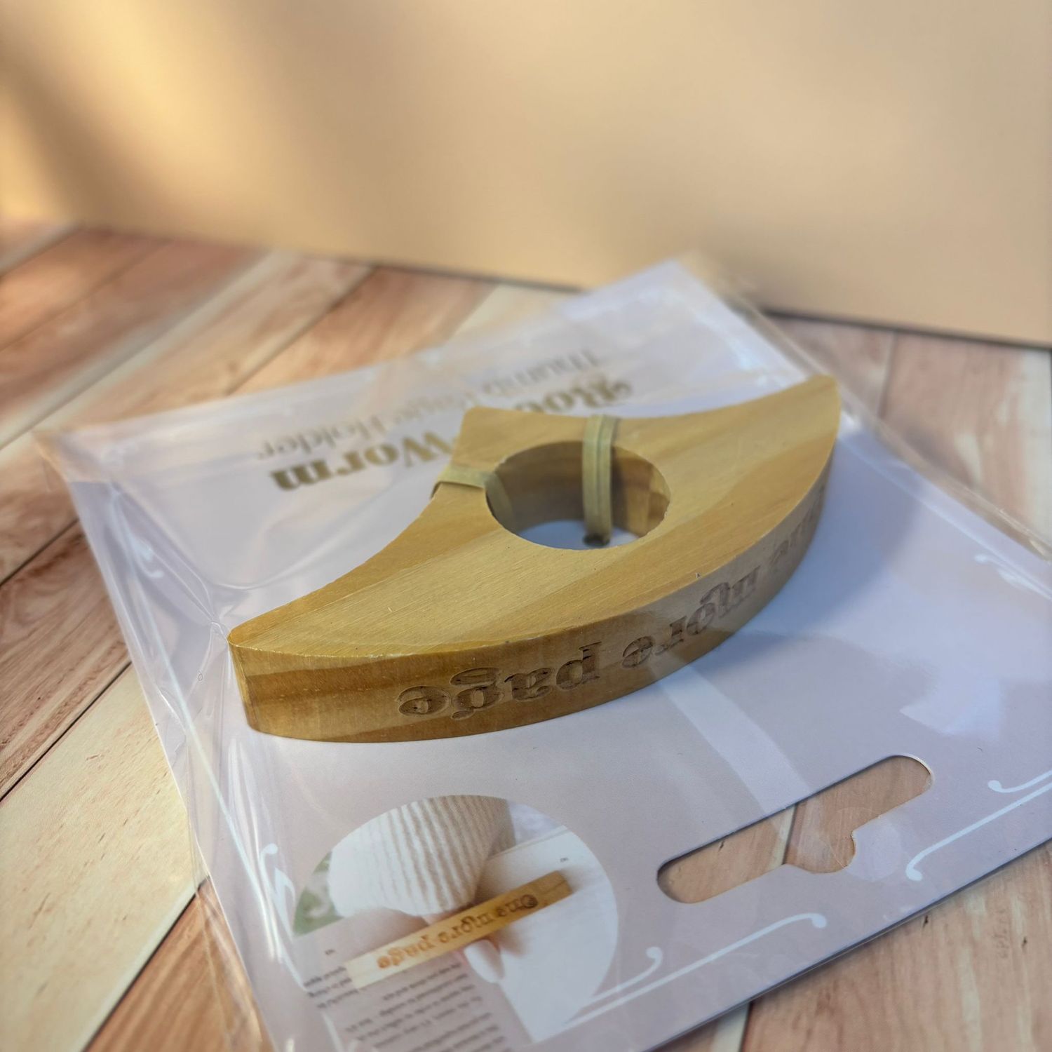 Daumen-Seitenhalter„One more page“