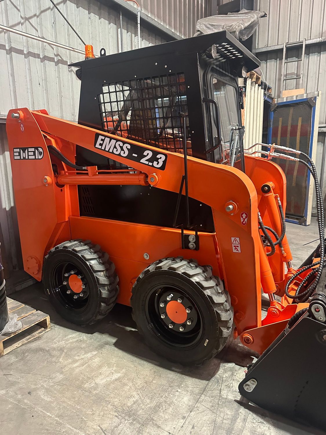 2.3 Tonne skid steer loader - enclosed cab, joystick controls Includes 4 in 1 bucket , Air Conditioning