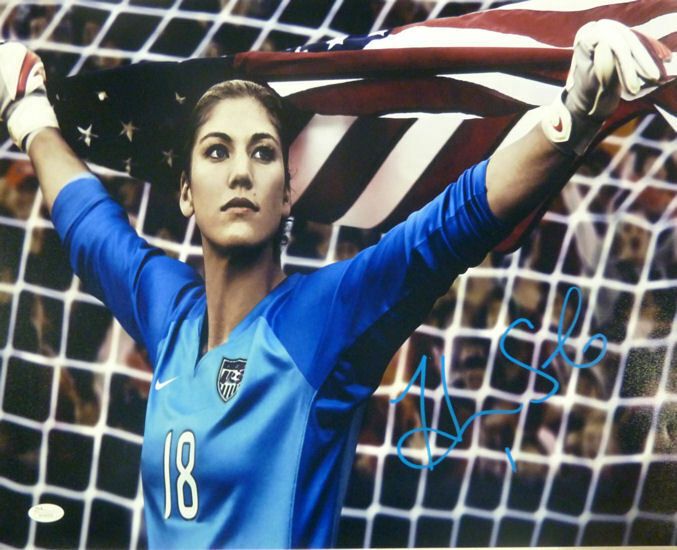 Hope Solo Autographed USA soccer 16x20 photo (holding USA flag) JSA
