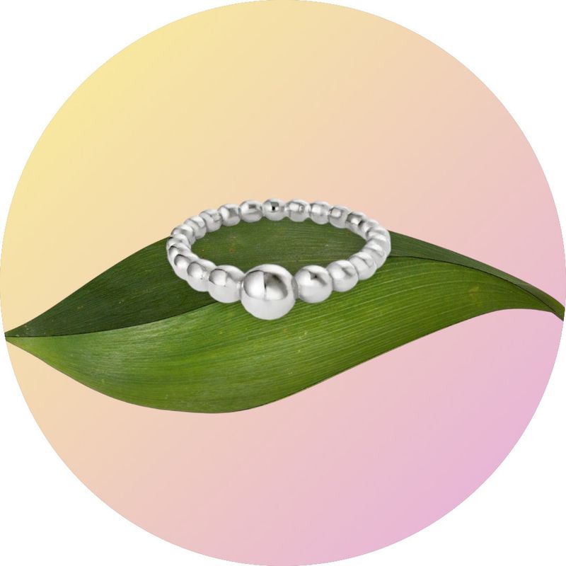 rvs ring met gekoppelde bolletjes