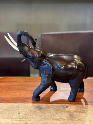 Resin Thai Elephant with Ivory and holding up its trunk ( XL )