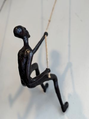 Climbing man - looking up posture