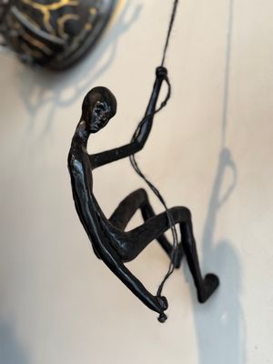 Climbing man - looking down posture