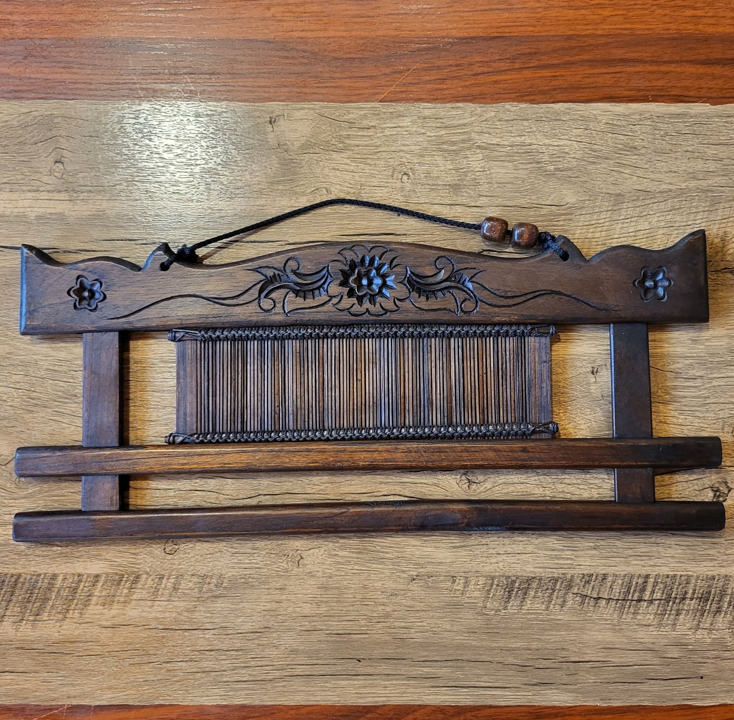 Hand-carved teakwood fabric hanger - 50cm
