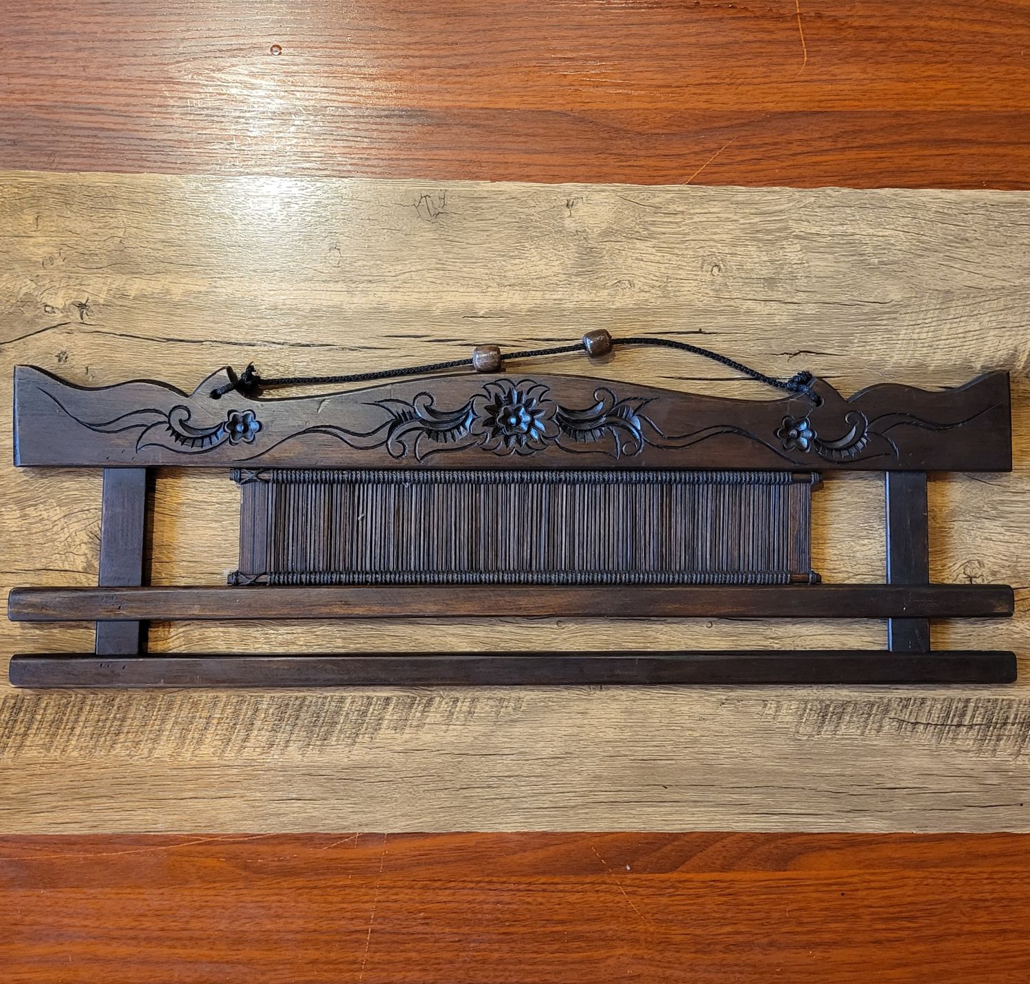 Hand-carved teakwood fabric hanger - 60cm