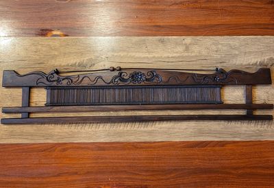 Hand-carved teakwood fabric hanger - 100cm
