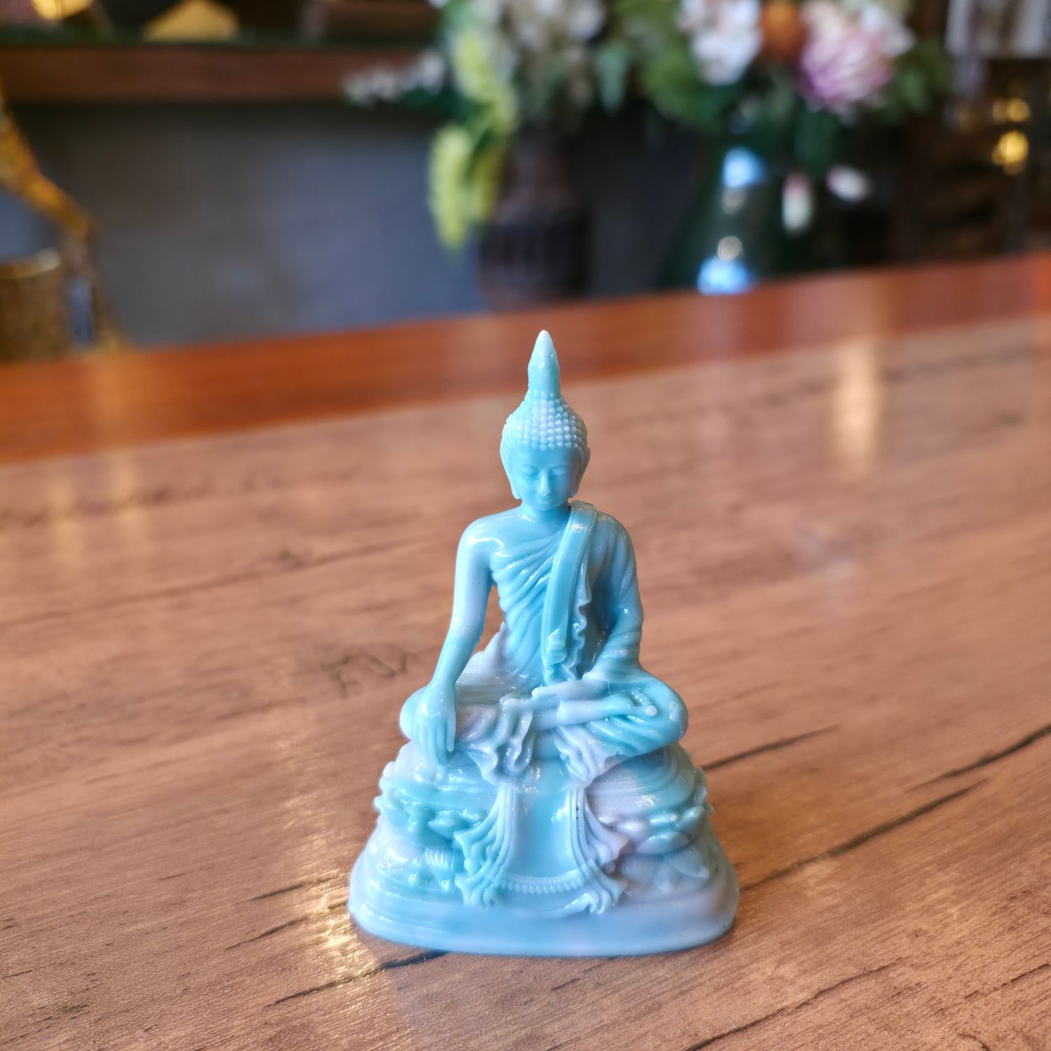 Two-toned resin Buddha Victory over Mara Posture - 9cm