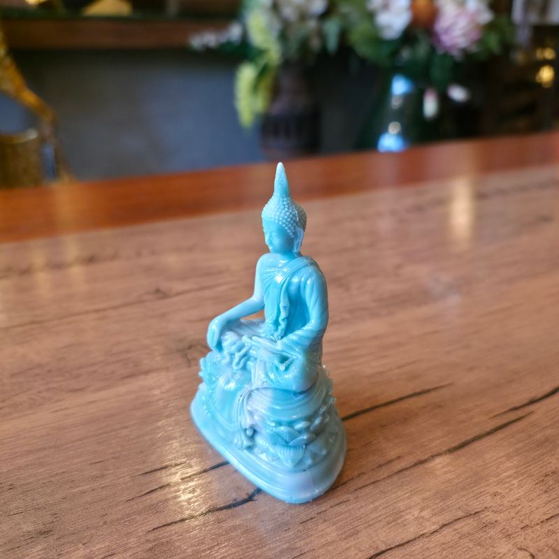 Two-toned resin Buddha Victory over Mara Posture - 9cm