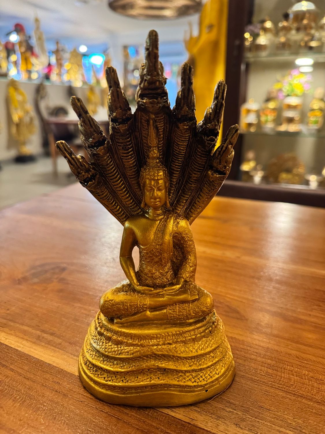 Resin Buddha Sheltered by Naga Hood - Gold