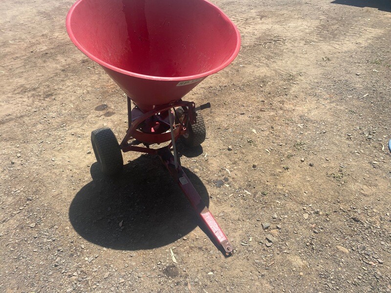 Tow behind ATV spreader