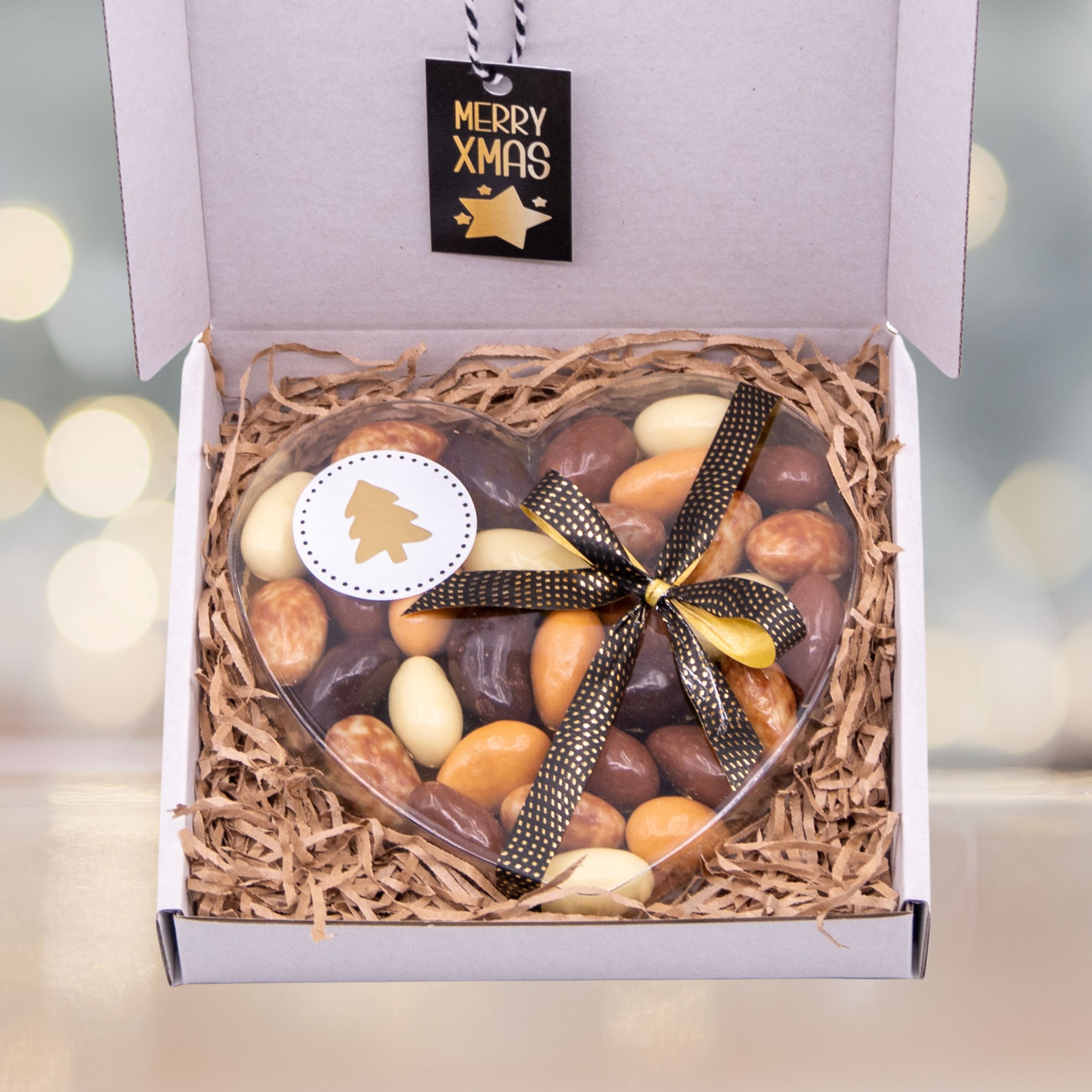 Brievenbuscadeau kerst met een doosje noten of chocolade