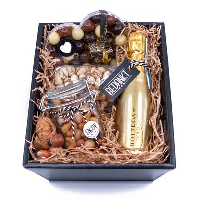 Geschenkmand met Prosecco of olijfolie, noten en chocolade