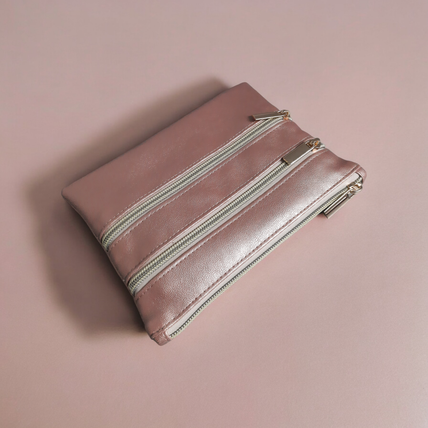 Pochette 3 zips saumon nacré