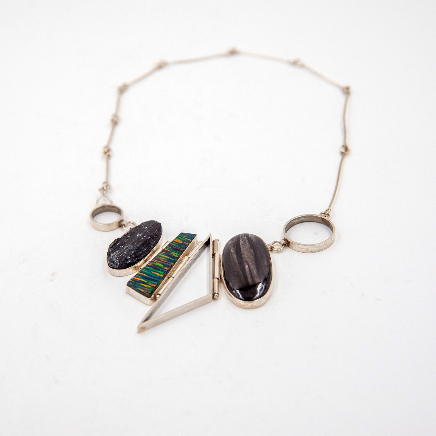 Dirigible Designs: Hinged necklace with lab opal, hypersthene, tourmaline