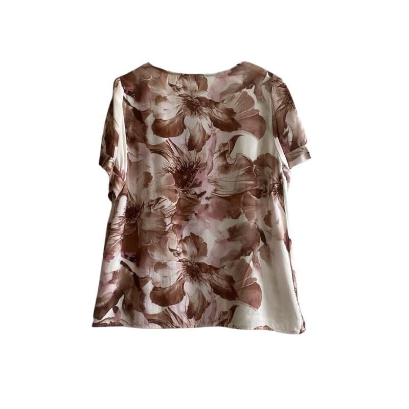 Blusa a fantasia floreale