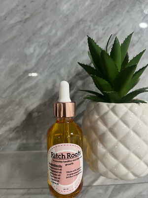 1 bottle of Ritch Roots hair oil