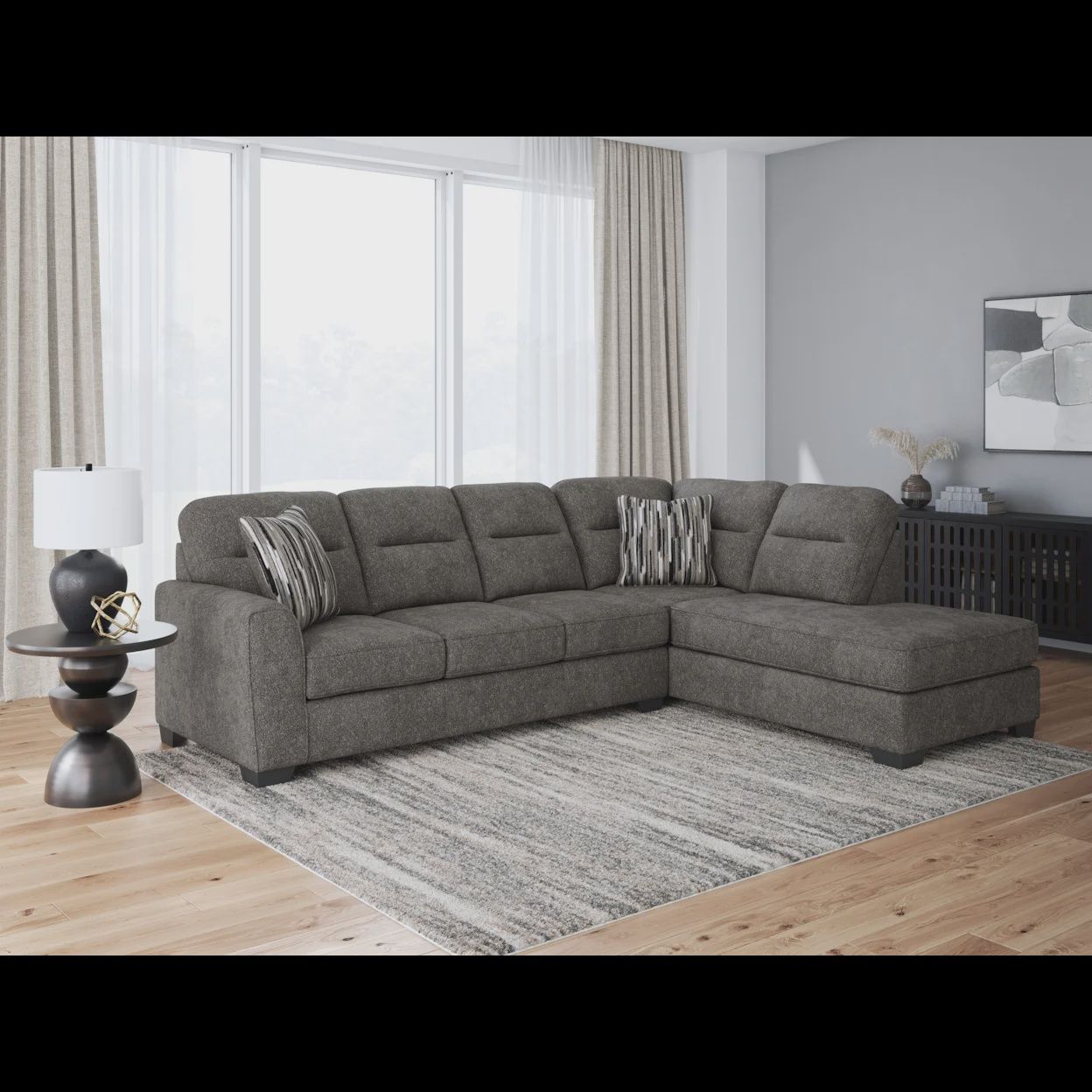 2-Piece Ashley Olten Sectional With Chaise
