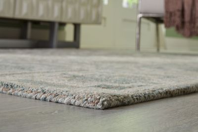 Jossland - 5' x 7' Rug - Turquoise / Ivory - Green