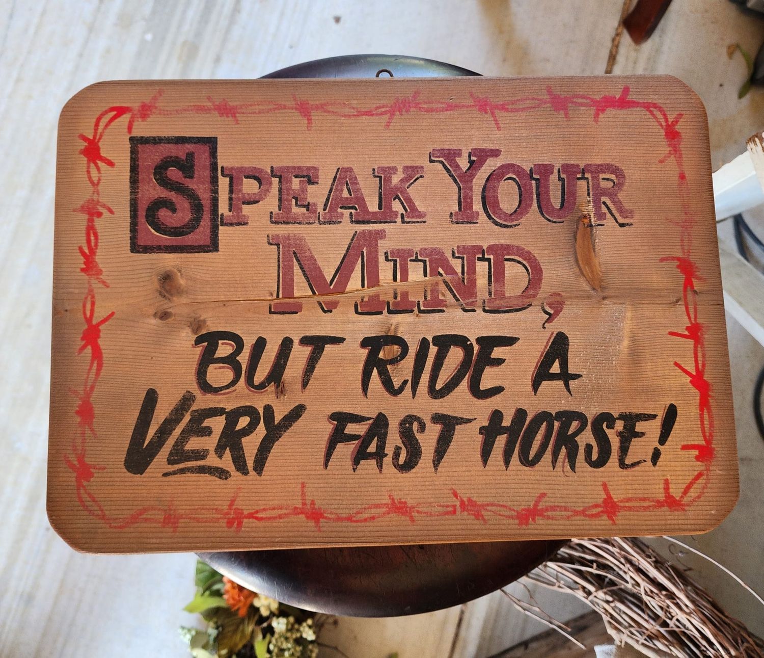 Cowboy Sign: Speak your mind but ride a fast horse