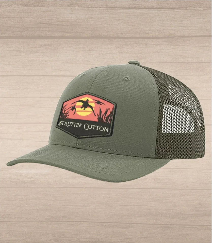 Evening Airshow Patch on Solid Loden Trucker