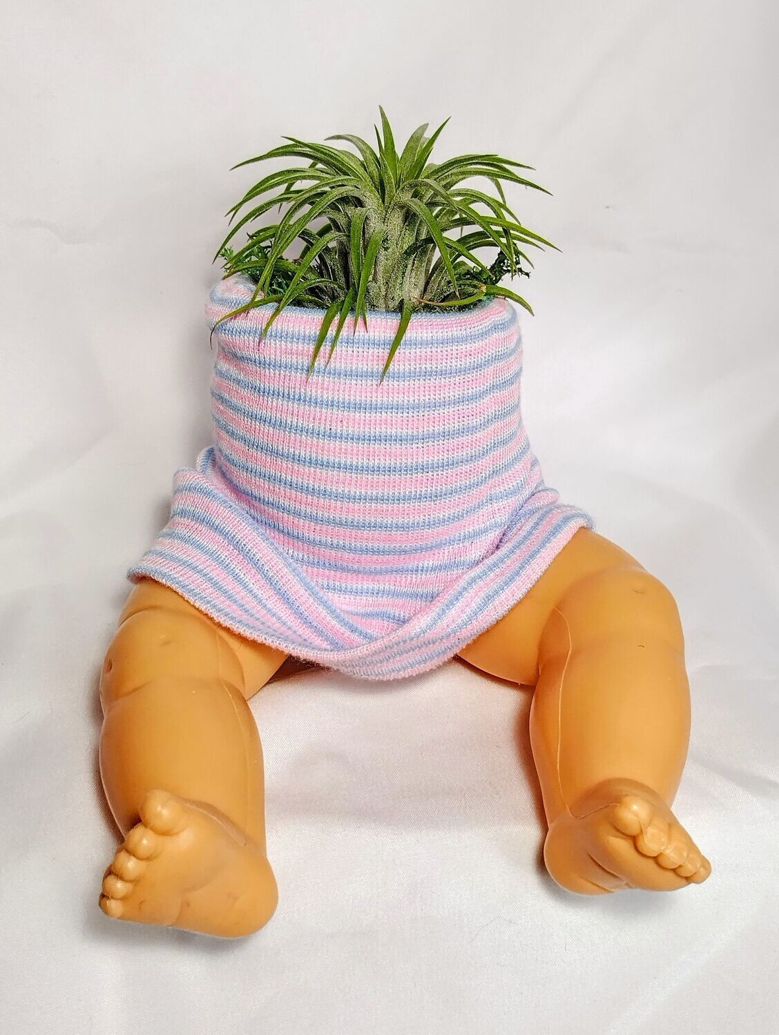 Sitting doll plant holder