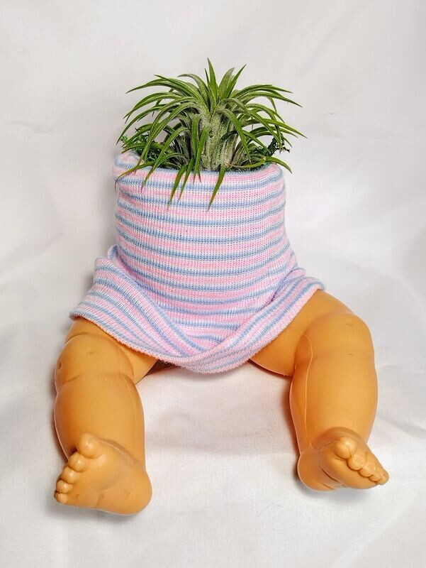 Sitting doll plant holder