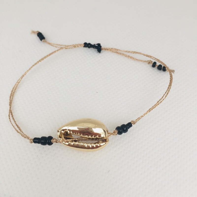 Goud/zwart met schelp