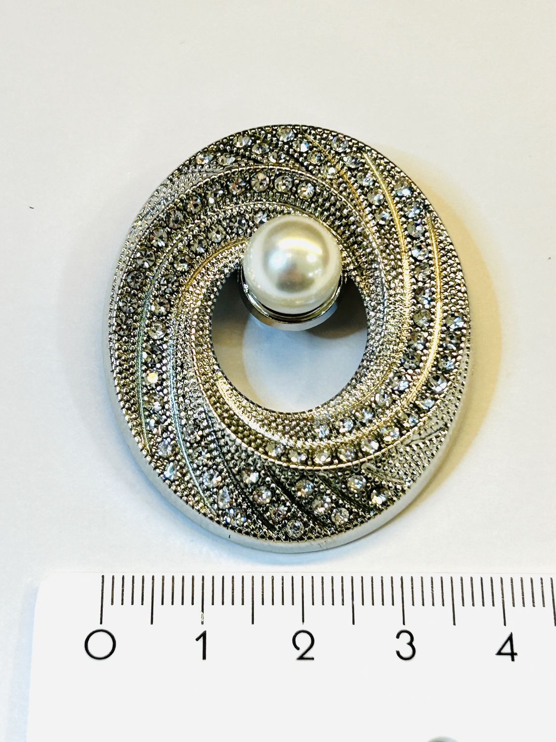 Broche fantasie met parel