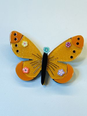Broche oranje vlinder