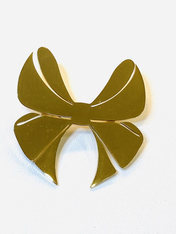 Broche metalen strik goudkleur