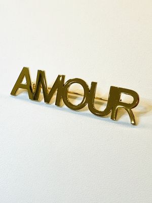 Broche AMOUR goudkleur