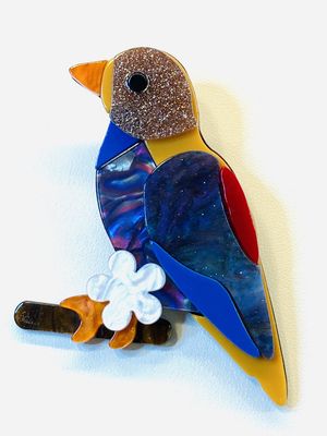 Broche vogel met bloemetje