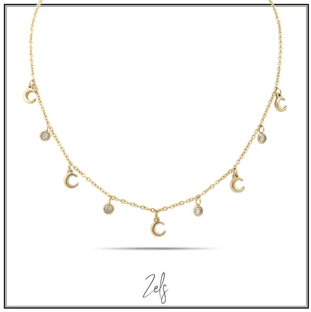 Charmante ketting met maan- en zirconia-hangertjes, subtiel, speels en een sprankelende touch
