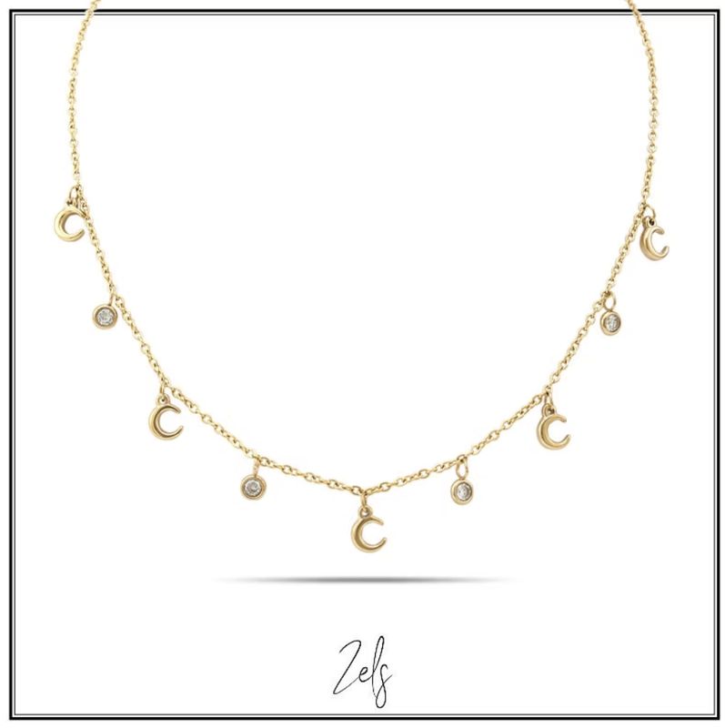 Charmante ketting met maan- en zirconia-hangertjes, subtiel, speels en een sprankelende touch