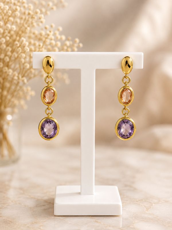 Elegante oorbellen met 2 facetgeslepen stenen, voor een warme uitstraling
