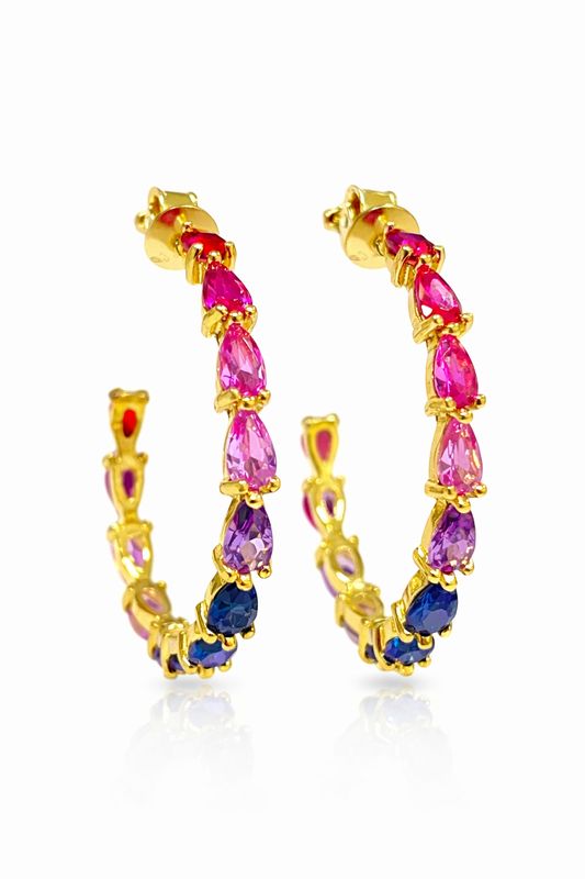 Oorringen 30 mm, met roze en paarse tinten steentjes.