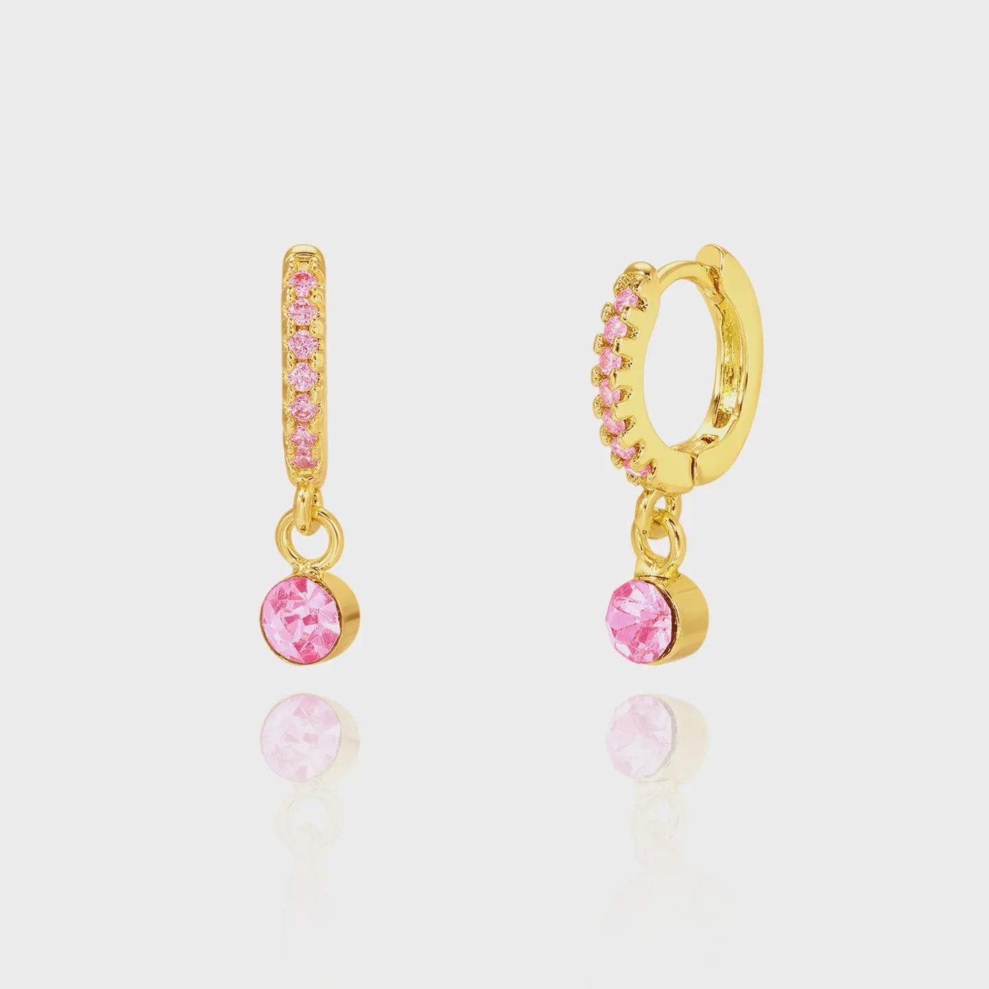 Oorbellen huggies met hangend roze blinkertje