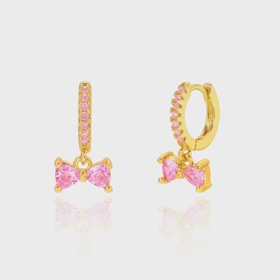 Oorbellen huggies met roze hangend strikje