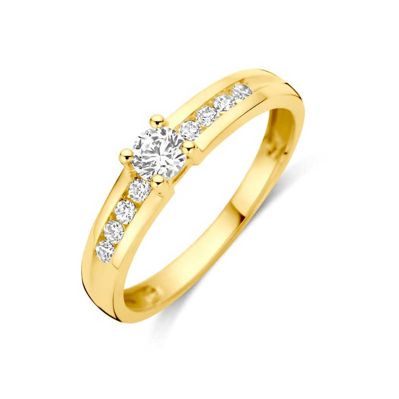 9k ring met centrale zirkonia en extra steentjes erlangs.