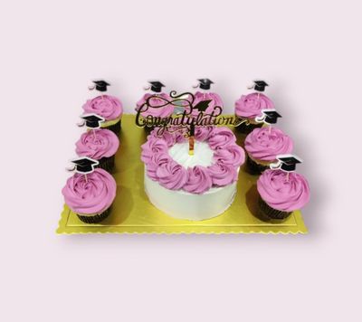 Pink Graduation Cake With Cupcakes