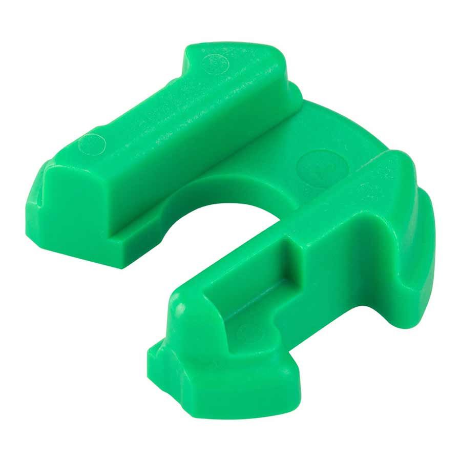 Green RockShox Gnar Dog volume reducer token for the Deluxe and Super Deluxe rear shock