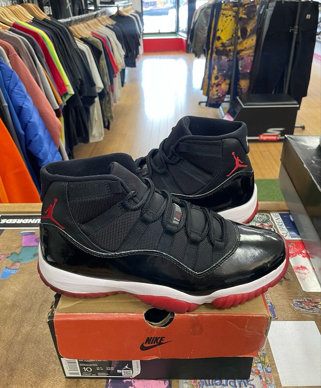 Pre-Owned Jordan 11 Retro Playoffs Bred (2019) Size 10