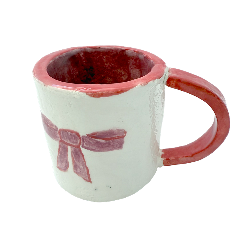 24. Ribbon Mugs By Sanya Wadhwa