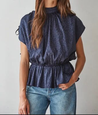 NAVY ANIMAL PRINT PEPLUM TOP
