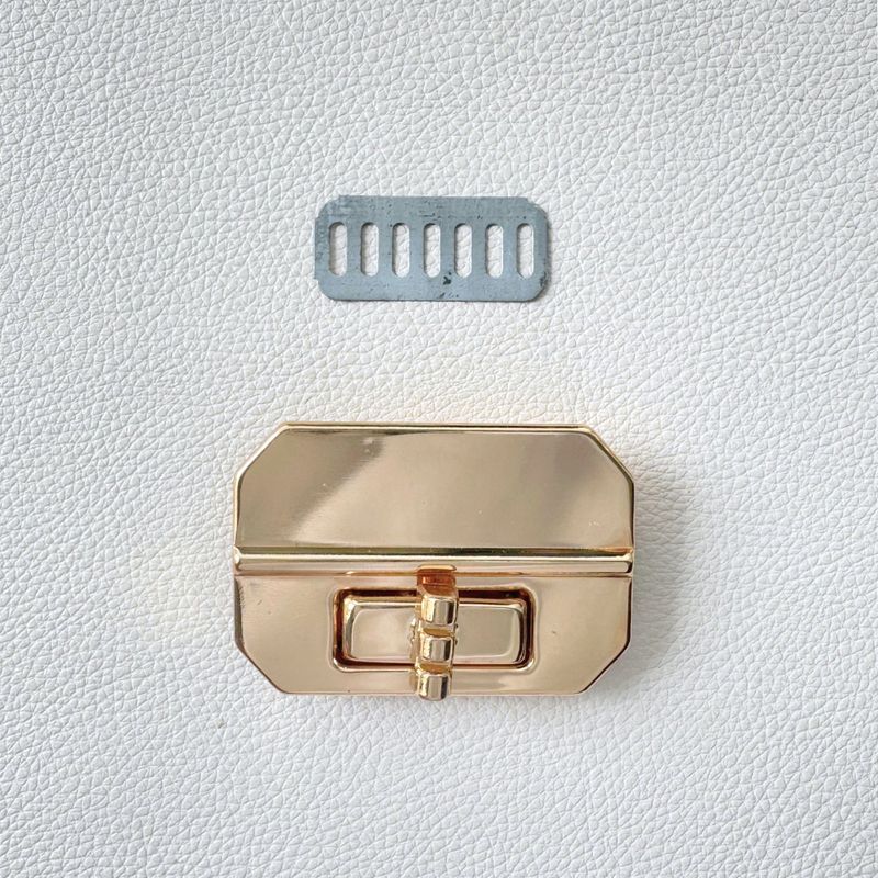 Broche torniquete - Dorado