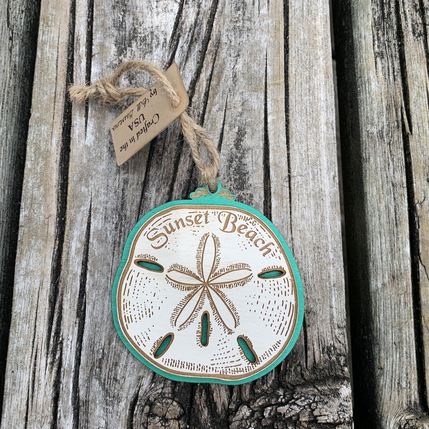 LRG SAND DOLLAR ORNAMENT (EMERALD)