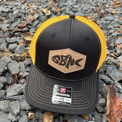 SBNC FISH HEX PATCH CAP BLACK/GOLD 112