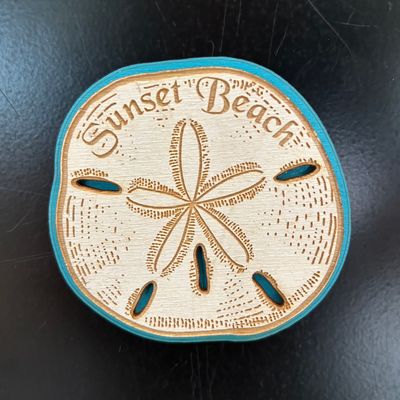 LRG SAND DOLLAR MAGNET (AQUA)